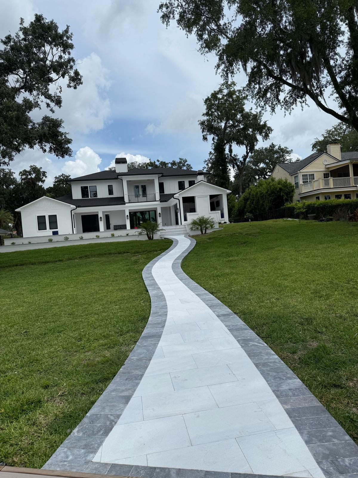 Elegant curved paver walkway in Jacksonville